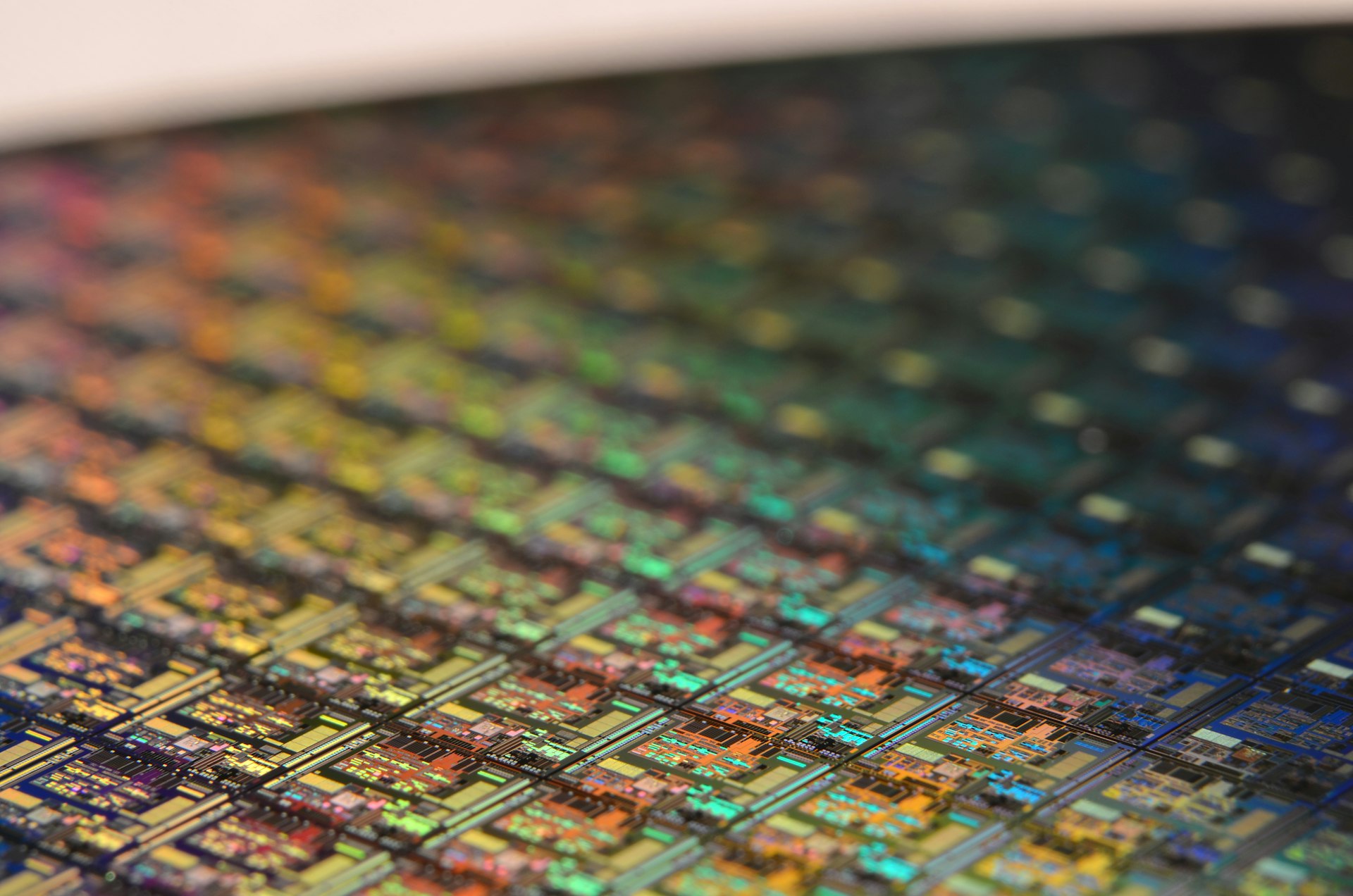 Close-up of a silicon semiconductor wafer, reflecting the chipmaker earnings driving Asian tech stock gains