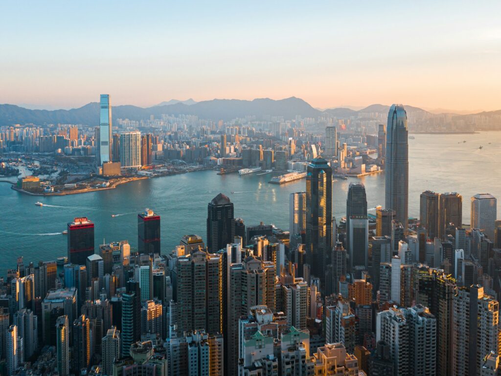 High-angle view of the Hong Kong skyline across Victoria Harbour
